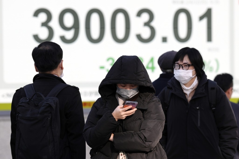 東京相隔6年發(fā)流感警報(bào)，街上行人都戴上口罩。