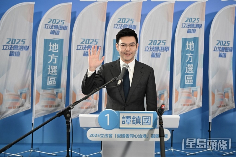 新社聯(lián)譚鎮(zhèn)國。